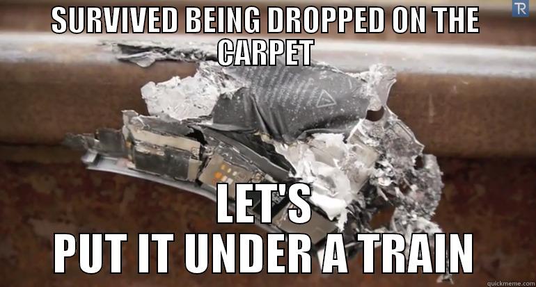 SURVIVED BEING DROPPED ON THE CARPET LET'S PUT IT UNDER A TRAIN Misc