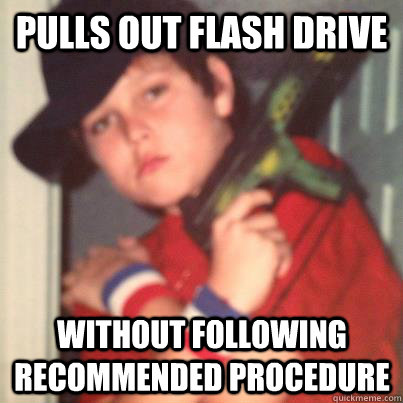 Pulls Out flash drive Without following recommended procedure  