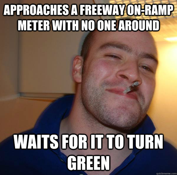 Approaches a freeway on-ramp meter with no one around Waits for it to turn green - Approaches a freeway on-ramp meter with no one around Waits for it to turn green  Misc