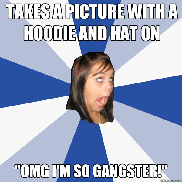 Takes a picture with a hoodie and hat on 