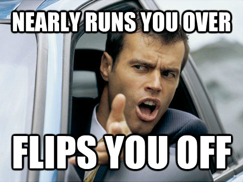 NEARLY RUNS YOU OVER FLIPS YOU OFF  Asshole driver