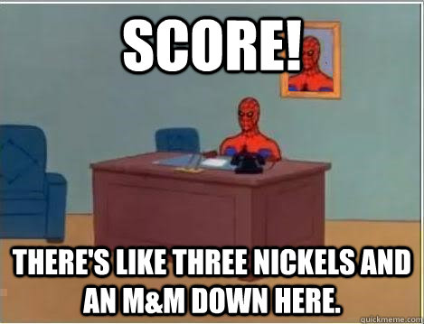 Score! There's like three nickels and an M&M down here.  Spiderman Desk