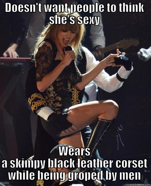 DOESN'T WANT PEOPLE TO THINK SHE'S SEXY WEARS A SKIMPY BLACK LEATHER CORSET WHILE BEING GROPED BY MEN Misc