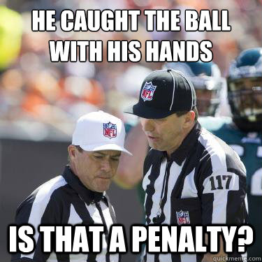 He caught the ball with his hands is that a penalty?  Replacement Refs