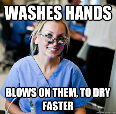 washes hands blows on them, to dry faster - washes hands blows on them, to dry faster  overworked dental student