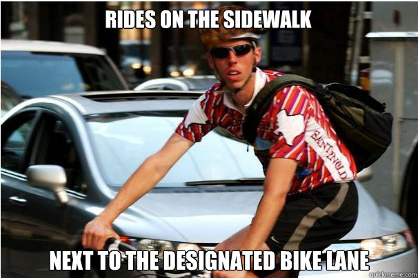 Rides on the sidewalk Next to the designated bike lane  