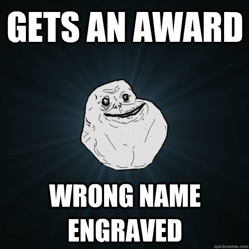 Gets an award wrong name engraved  Forever Alone