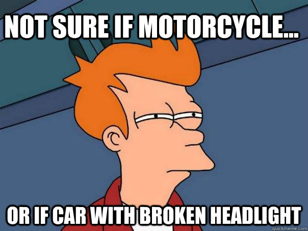 Not sure if motorcycle... Or if car with broken headlight  Futurama Fry