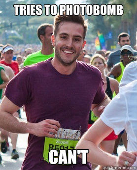 Tries to photobomb Can't  Ridiculously photogenic guy