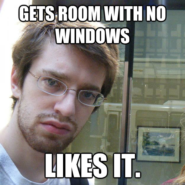 gets room with no windows likes it.  Awkward roommate