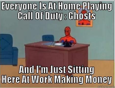 EVERYONE IS AT HOME PLAYING CALL OF DUTY : GHOSTS AND I'M JUST SITTING HERE AT WORK MAKING MONEY Spiderman Desk