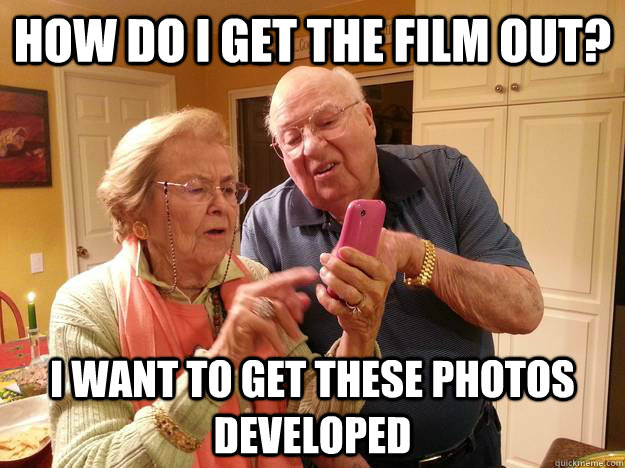 How do i get the film out? I want to get these photos developed - How do i get the film out? I want to get these photos developed  Technologically Challenged Grandparents