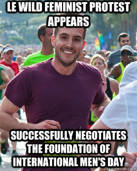 lE wild feminist protest appears SUCCESSFULLY NEGOTIATES  THE FOUNDATION OF international Men's DAY  Ridiculously photogenic guy