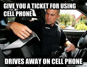 give you a ticket for using cell phone drives away on cell phone  