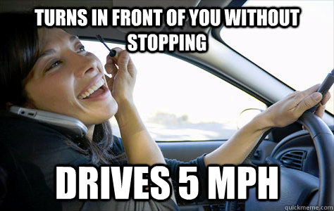 Turns in front of you without stopping Drives 5 mph  