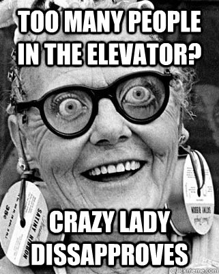 Too many people in the elevator? Crazy lady dissapproves   