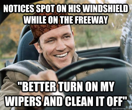 Notices spot on his windshield while on the freeway 