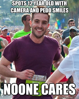 Spots 12 year old with camera and pedo smiles noone cares  Ridiculously photogenic guy