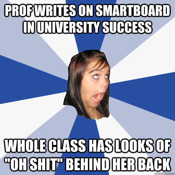 Prof writes on Smartboard in University Success Whole class has looks of 