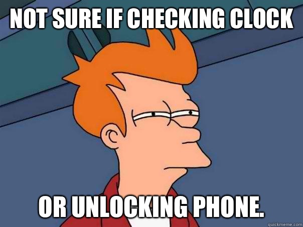 Not sure if checking clock Or unlocking phone.  Futurama Fry