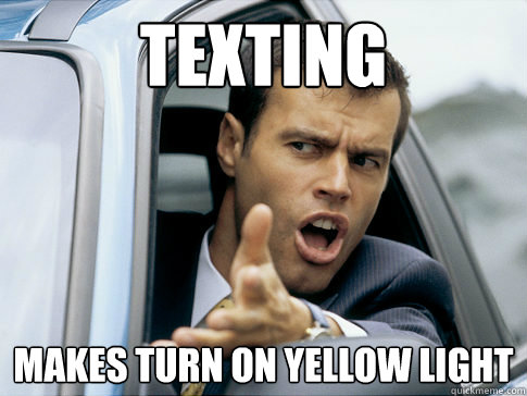 texting  makes turn on yellow light  Asshole driver