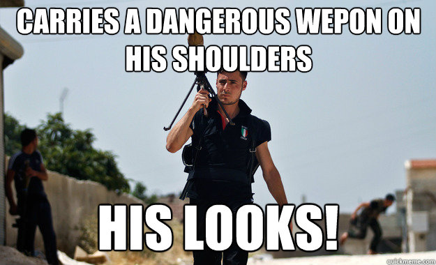 carries a dangerous wepon on his shoulders His looks!  Ridiculously Photogenic Syrian Soldier