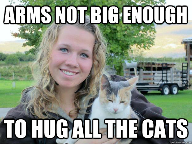 Arms not big enough to hug all the cats  