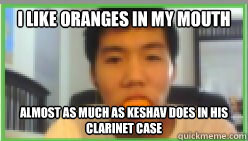 I like oranges in my mouth almost as much as keshav does in his clarinet case - I like oranges in my mouth almost as much as keshav does in his clarinet case  Asian With Orange