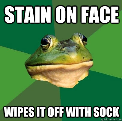 Stain on face wipes it off with sock  Foul Bachelor Frog