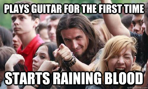 Plays guitar for the first time starts raining blood  Ridiculously Photogenic Metal Fan