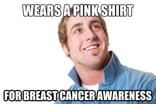 wears a pink shirt for breast cancer awareness  Misunderstood D-Bag