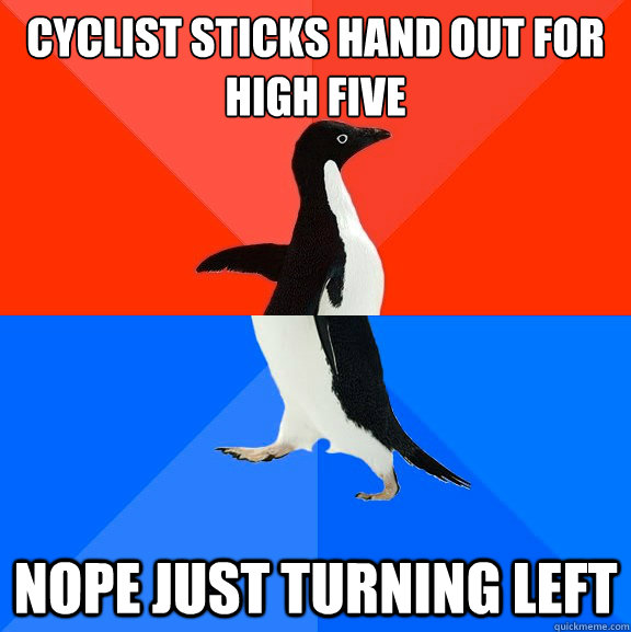 cyclist sticks hand out for high five nope just turning left  Socially Awesome Awkward Penguin