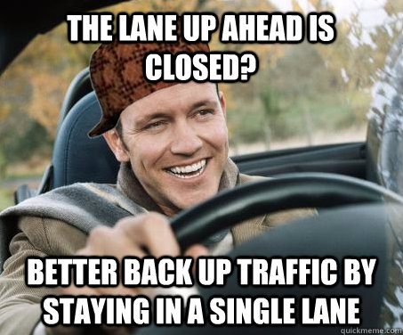 The lane up ahead is closed? Better back up traffic by staying in a single lane  SCUMBAG DRIVER