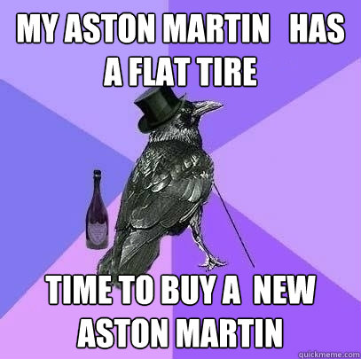 my aston martin   has  a flat tire time to buy a  new aston martin  Rich Raven
