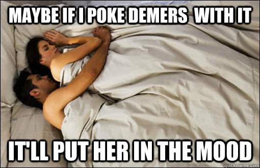 Maybe if i poke demers  with it it'll put her in the mood  spooning couple