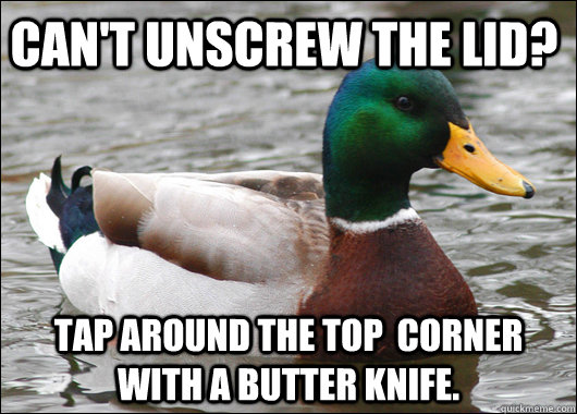 Can't unscrew the lid? Tap around the top  corner with a butter knife.  Actual Advice Mallard