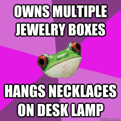 owns multiple jewelry boxes hangs necklaces on desk lamp  Foul Bachelorette Frog
