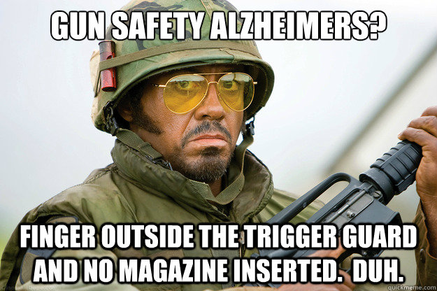 Gun Safety Alzheimers? finger outside the trigger guard and no magazine inserted.  Duh. - Gun Safety Alzheimers? finger outside the trigger guard and no magazine inserted.  Duh.  Insightful Confused Robert Downey Jr