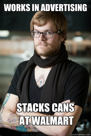 works in advertising STACKS CANS
 AT WALMART  Hipster Barista