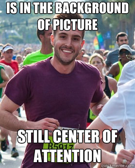 Is in the background of picture Still center of attention  Ridiculously photogenic guy