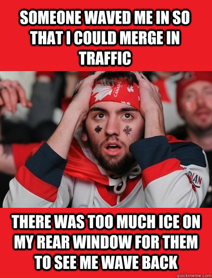 someone waved me in so that i could merge in traffic there was too much ice on my rear window for them to see me wave back  