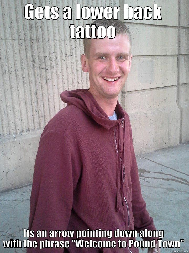 GETS A LOWER BACK TATTOO ITS AN ARROW POINTING DOWN ALONG WITH THE PHRASE 