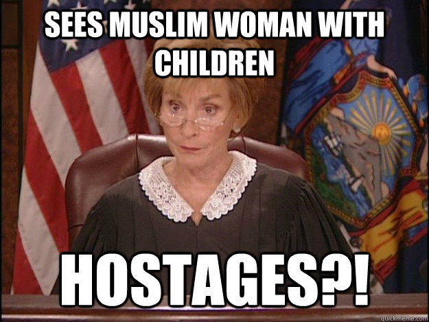 sees muslim woman with children hostages?!  