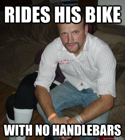 Rides His Bike With no Handlebars   