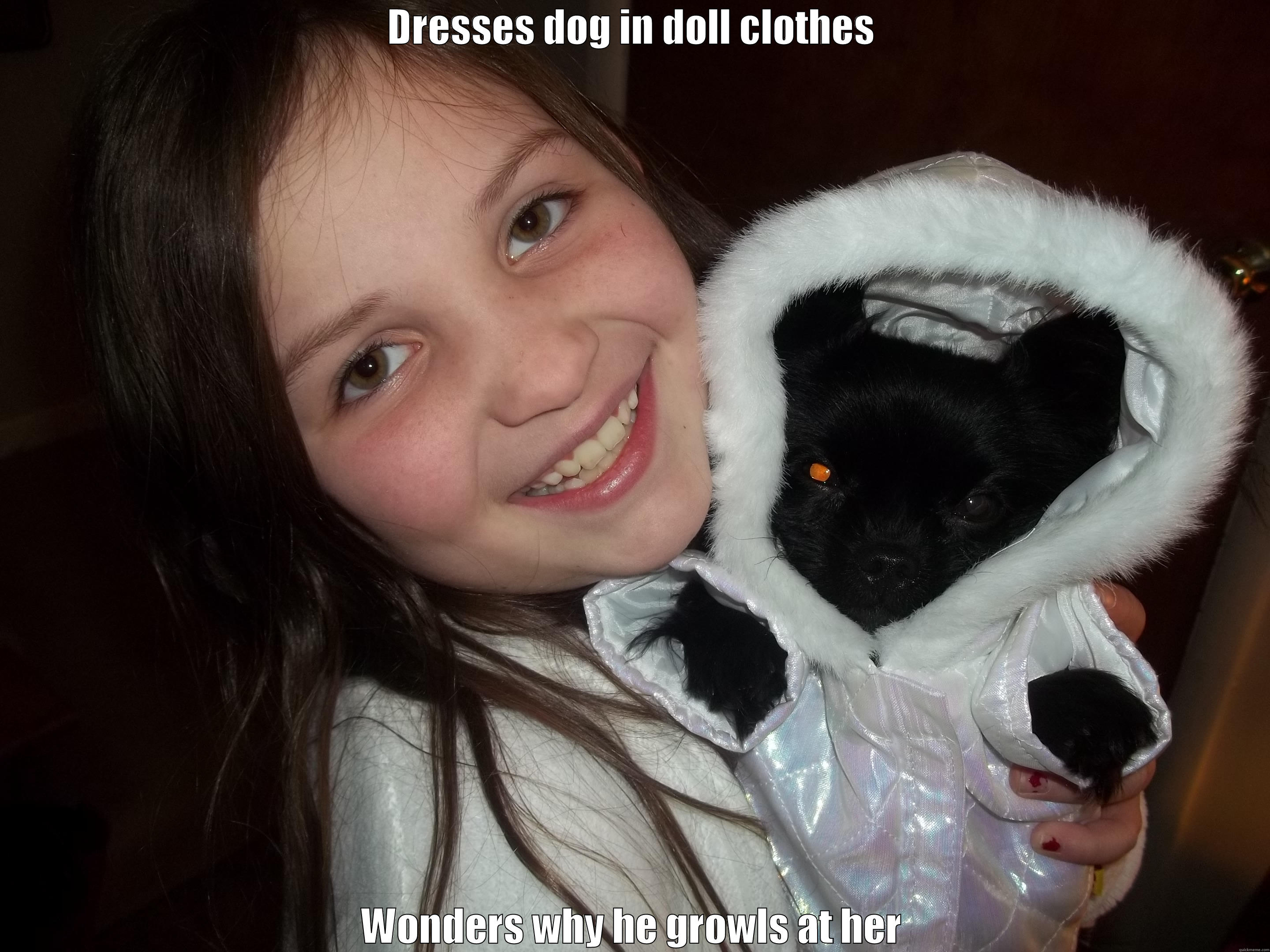 DRESSES DOG IN DOLL CLOTHES WONDERS WHY HE GROWLS AT HER Misc