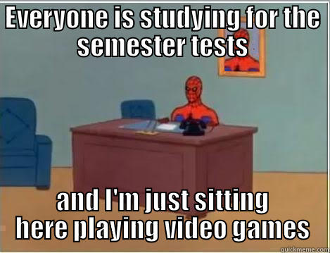 EVERYONE IS STUDYING FOR THE SEMESTER TESTS AND I'M JUST SITTING HERE PLAYING VIDEO GAMES Spiderman Desk