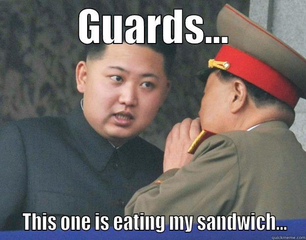           GUARDS...             THIS ONE IS EATING MY SANDWICH... Hungry Kim Jong Un