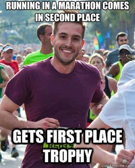 Running in a marathon comes in second place Gets first place trophy  Ridiculously photogenic guy