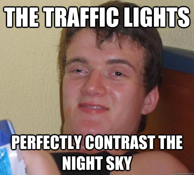 The traffic lights perfectly contrast the night sky  10 Guy