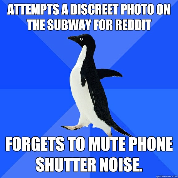Attempts a discreet photo on the subway for Reddit forgets to mute phone shutter noise.  Socially Awkward Penguin